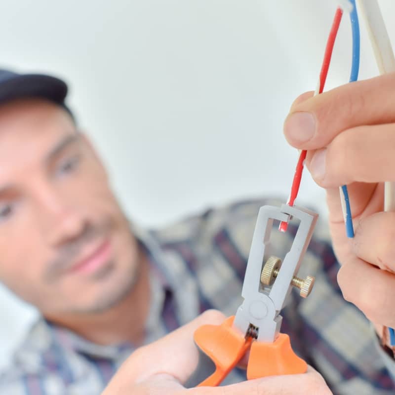 Electrician Stripping Wires@2x